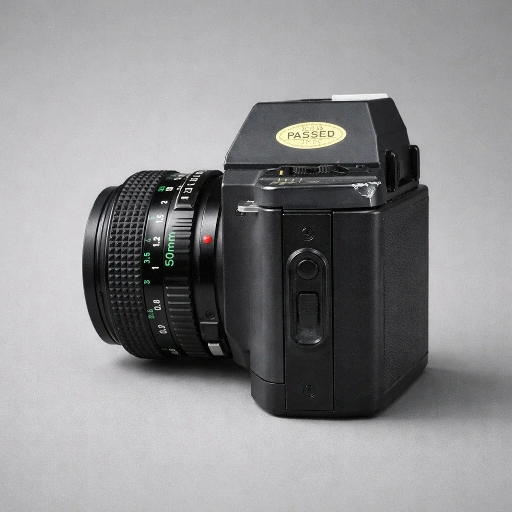 Canon T70 SLR Film Camera 50mm Lens Black Fair Missing Battery Door Disney Cap